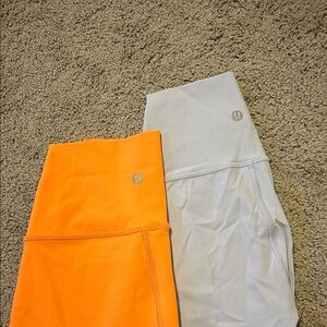 TWO pairs of lululemon wunder under leggings size 2